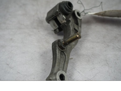 Baksidan på Bromsoksfäste från en Honda XRV 750 -1993 motorcykel.