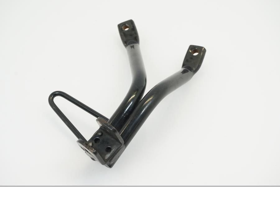 Framsidan på Fotpinnefäste från en Yamaha WR 125 -2010 motorcykel.