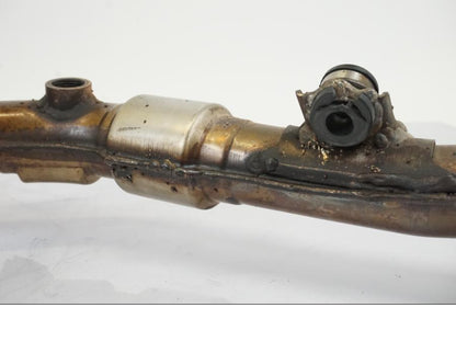 Vänster sida på Ljuddämpare från en Honda NT 700 -2008 motorcykel.