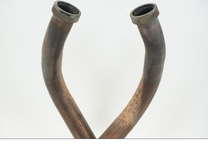 Snett nerifrån på Grenrör från en Honda VFR 800 -2003 motorcykel.