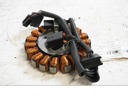 Framsidan på Generator från en Suzuki GSF 650 -2011 motorcykel.