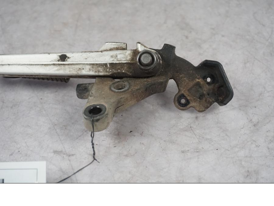 Vänster sida på Sidostöd från en Triumph Tiger Explorer -2016 motorcykel.