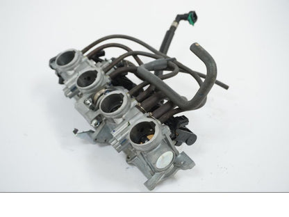 Baksidan på Spjällhus från en Honda CB 650 R -2019 motorcykel.