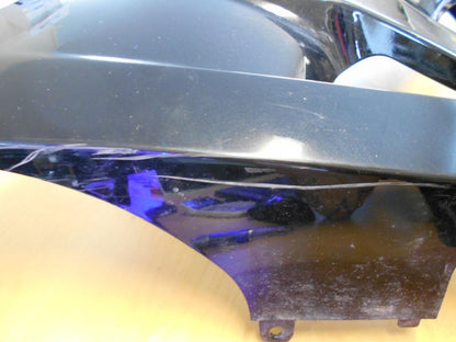 Baksidan på Sidkåpa från en Kawasaki Ninja 250 -2008 motorcykel.