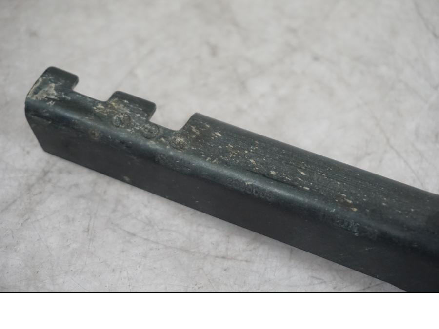 Baksidan på Plåtkåpa från en Triumph Tiger -2009 motorcykel.