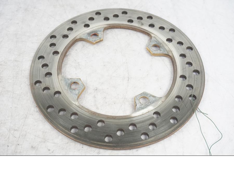 Framsidan på Bromsskiva från en Kawasaki Z 1000 -2003 motorcykel.