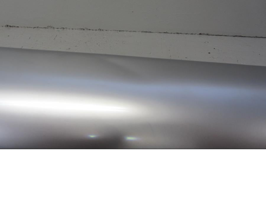 Baksidan på Ljuddämpare från en H-D V-Rod 1130 -2009 motorcykel.