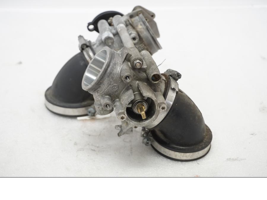 Höger sida på Spjällhus från en Ducati Monster 696 -2010 motorcykel.