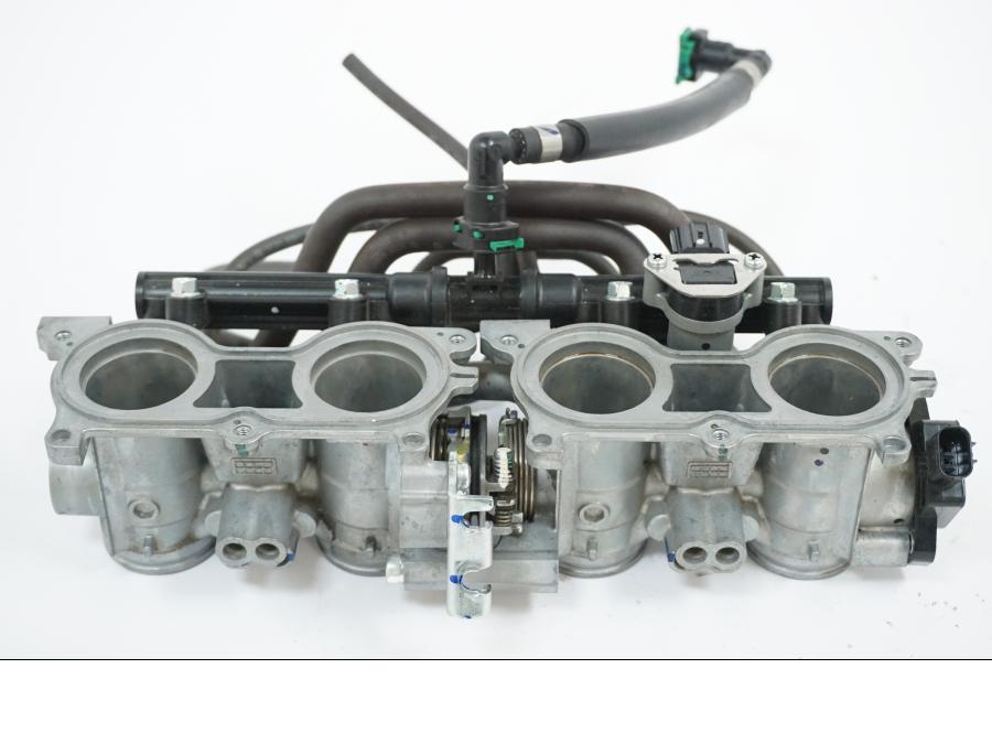 Framsidan på Spjällhus från en Honda CB 650 R -2019 motorcykel.