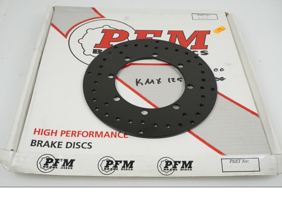 Baksidan på Bromsskiva från en Kawasaki KMX 125 -2000 motorcykel.