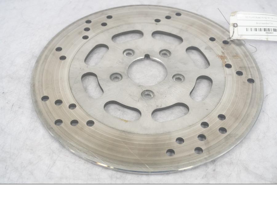 Framsidan på Bromsskiva från en H-D Touring Road King FLHR/I -1997 motorcykel.