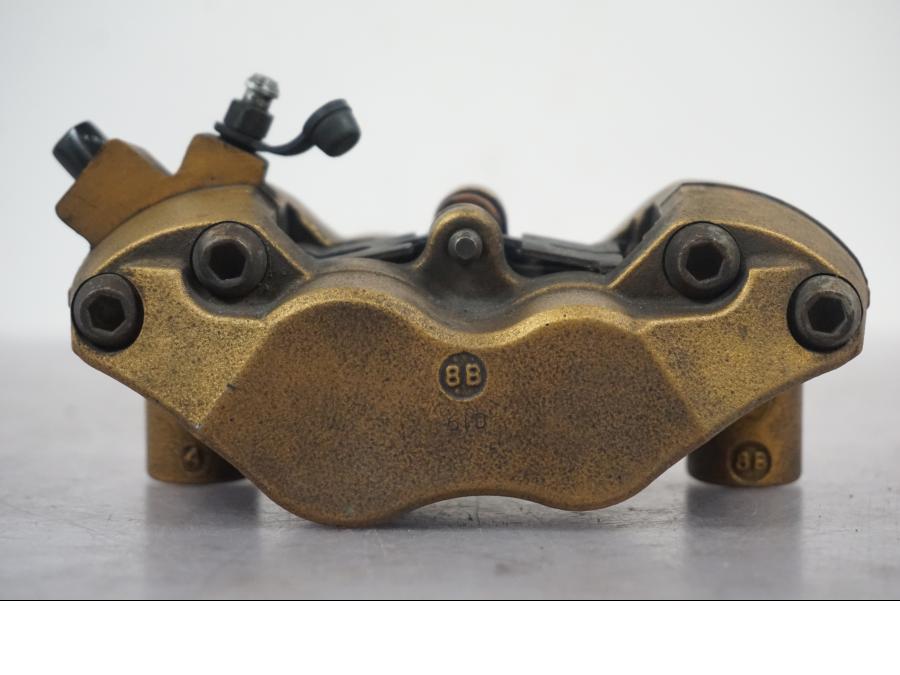 Snett nerifrån på Bromsok från en Triumph Tiger -2009 motorcykel.