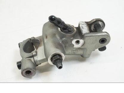 Framsidan på Bromshuvudcylinder från en Ducati Streetfighter S -2011 motorcykel.