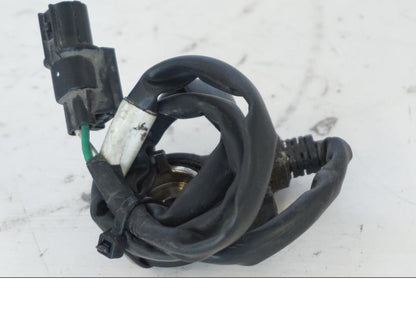 Snett uppifrån på Sidostödsbrytare från en Honda SH 300 A -2011 scooter.