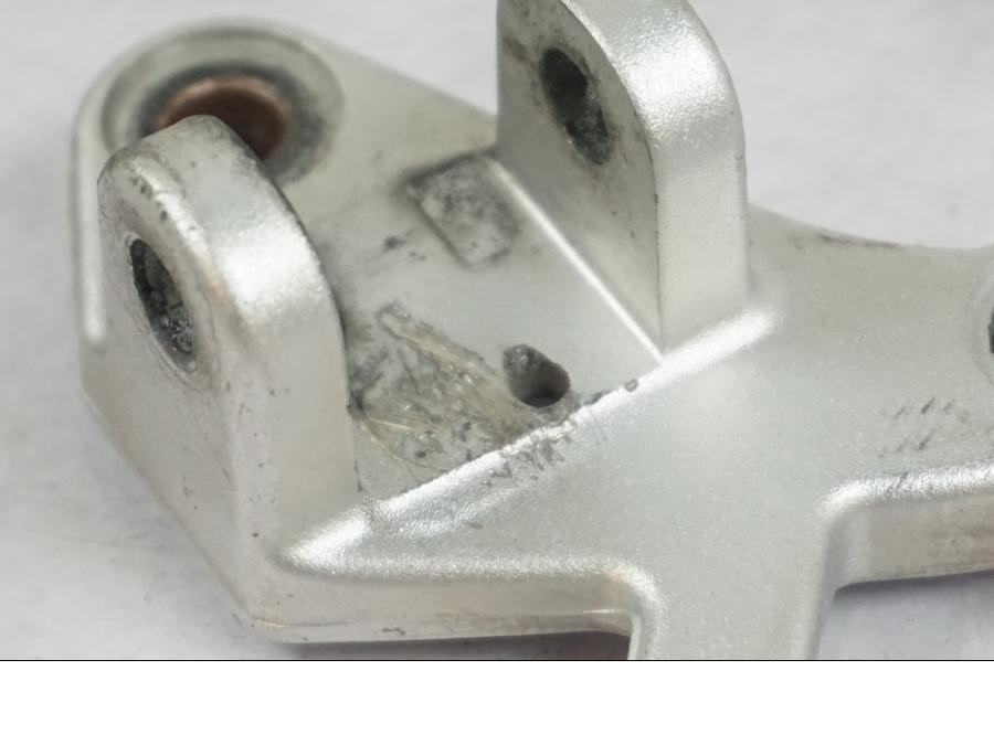 Snett uppifrån på Fotpinnefäste från en BMW R 1200 R -2007 motorcykel.