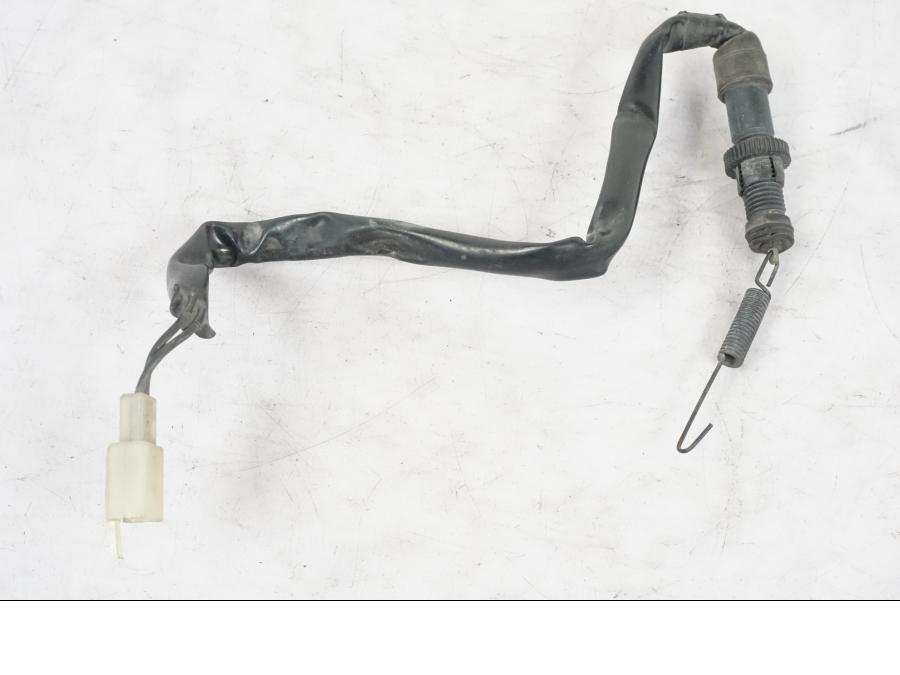 Framsidan på Bromsljuskontakt från en Honda NT 650 V -2002 motorcykel.