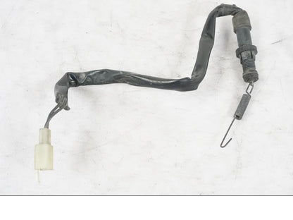 Framsidan på Bromsljuskontakt från en Honda NT 650 V -2002 motorcykel.