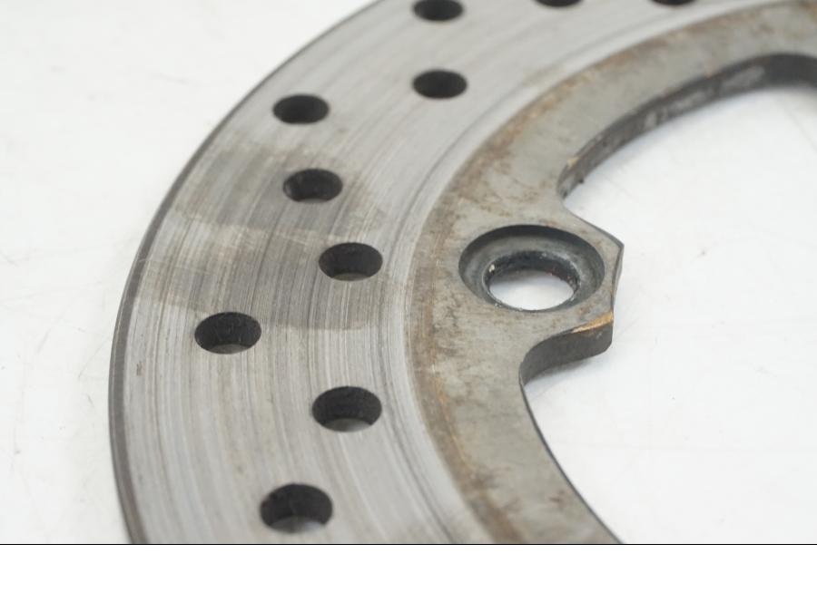 Vänster sida på Bromsskiva från en Yamaha YZF 1000 R1 -2004 motorcykel.