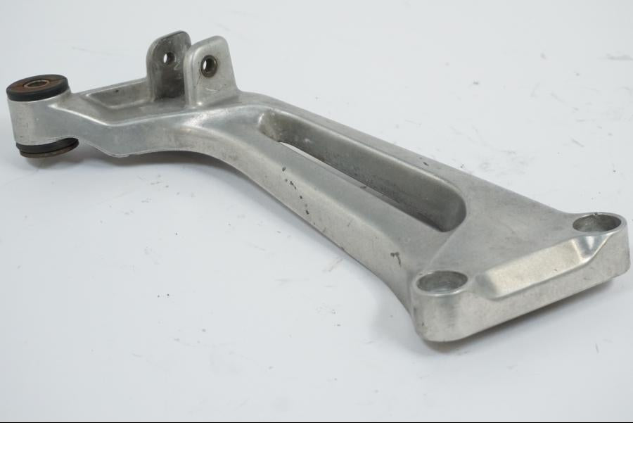 Vänster sida på Fotpinnefäste från en Honda VTR 1000 F -1999 motorcykel.