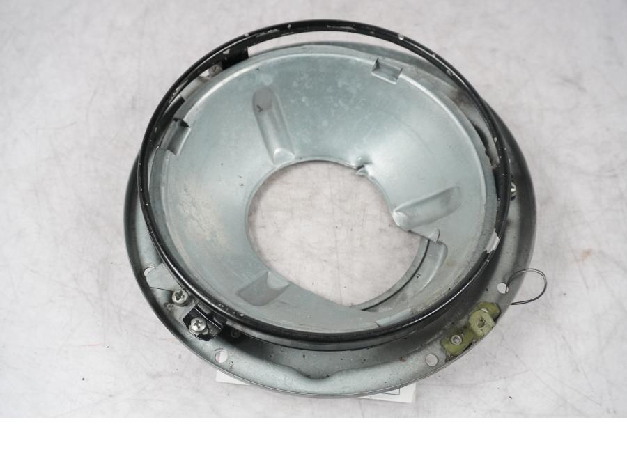 Vänster sida på Strålkastarhus från en H-D Touring Street Glide FLHX -2009 motorcykel.