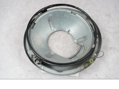 Vänster sida på Strålkastarhus från en H-D Touring Street Glide FLHX -2009 motorcykel.