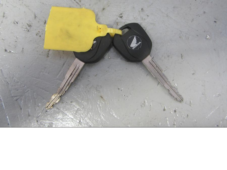 Vänster sida på Låssats från en Honda CB 1000 R -2010 motorcykel.