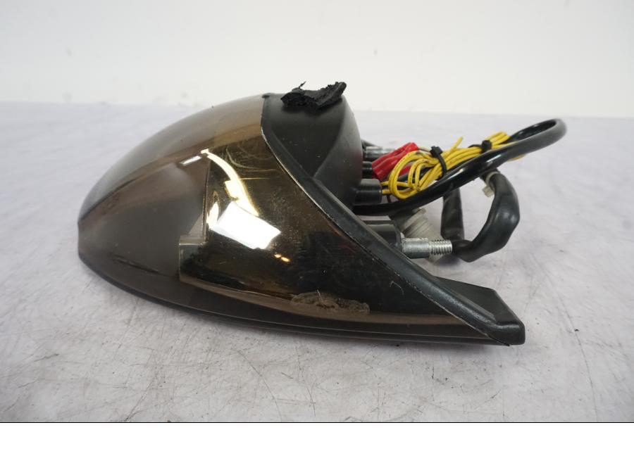 Vänster sida på Baklampa från en KTM 990 Super Duke -2006 motorcykel.