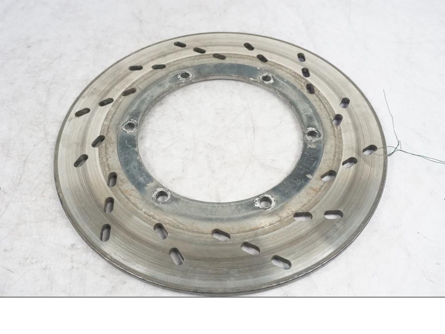 Framsidan på Bromsskiva från en Suzuki GS 1000 -1983 motorcykel.