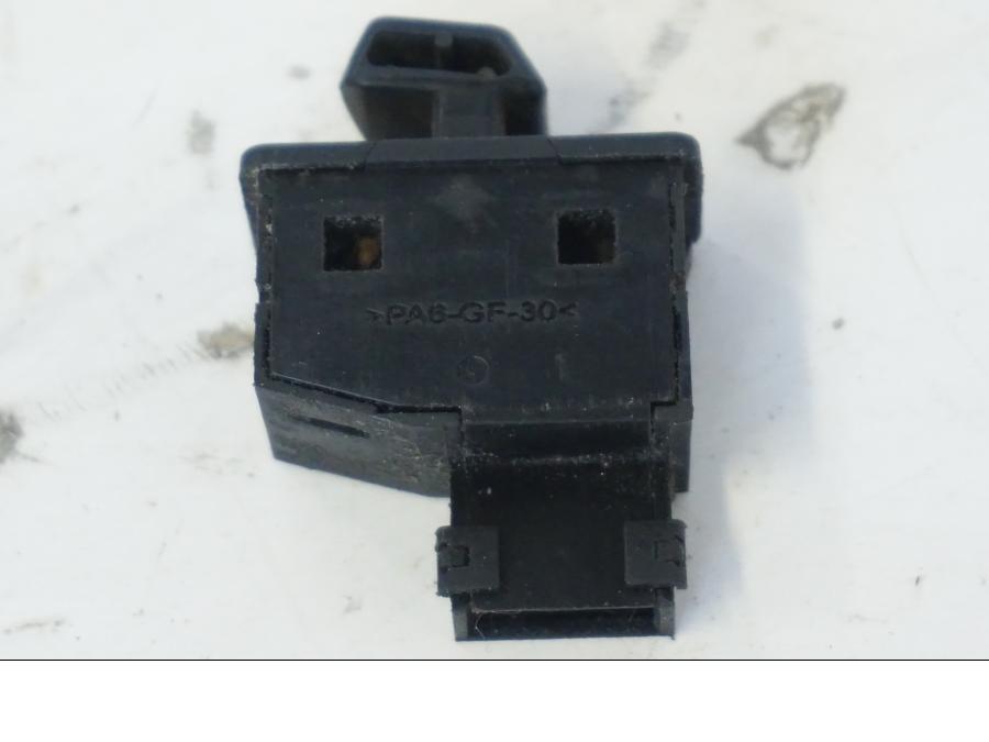 Snett uppifrån på Tryckknappsreglage från en Honda SH 300 A -2011 scooter.