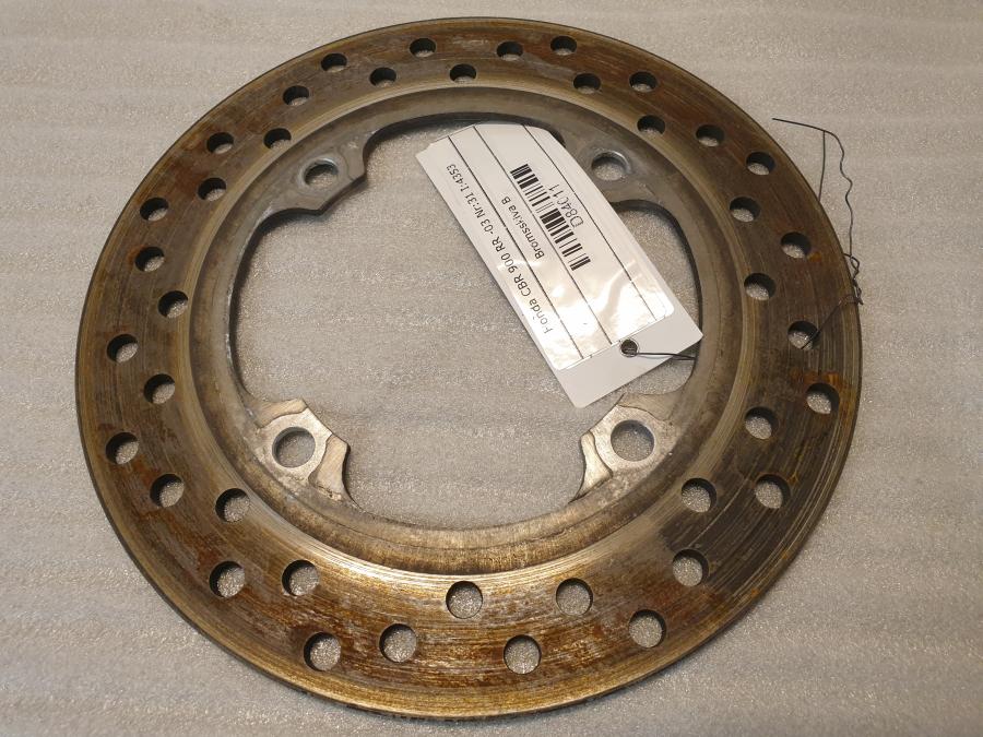 Baksidan på Bromsskiva från en Honda CBR 900 RR -2003 motorcykel.