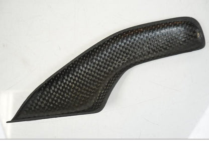 Snett nerifrån på Kedjeskydd från en Aprilia RS 125 -2008 motorcykel.