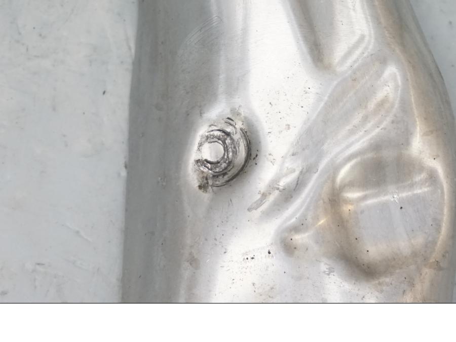 Höger sida på Värmeskydd från en Honda CBR 1000 RR -2004 motorcykel.