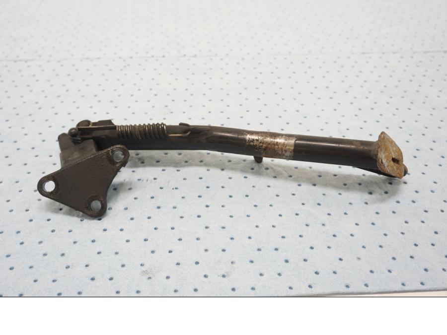 Baksidan på Sidostöd från en Triumph Tiger -2001 motorcykel.