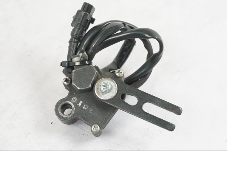 Snett uppifrån på Sidostödsbrytare från en Kawasaki Z 900 -2019 motorcykel.