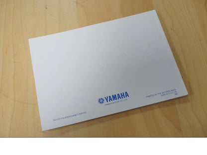 Baksidan på Instruktionsbok från en Yamaha XVS 1100 -2006 motorcykel.