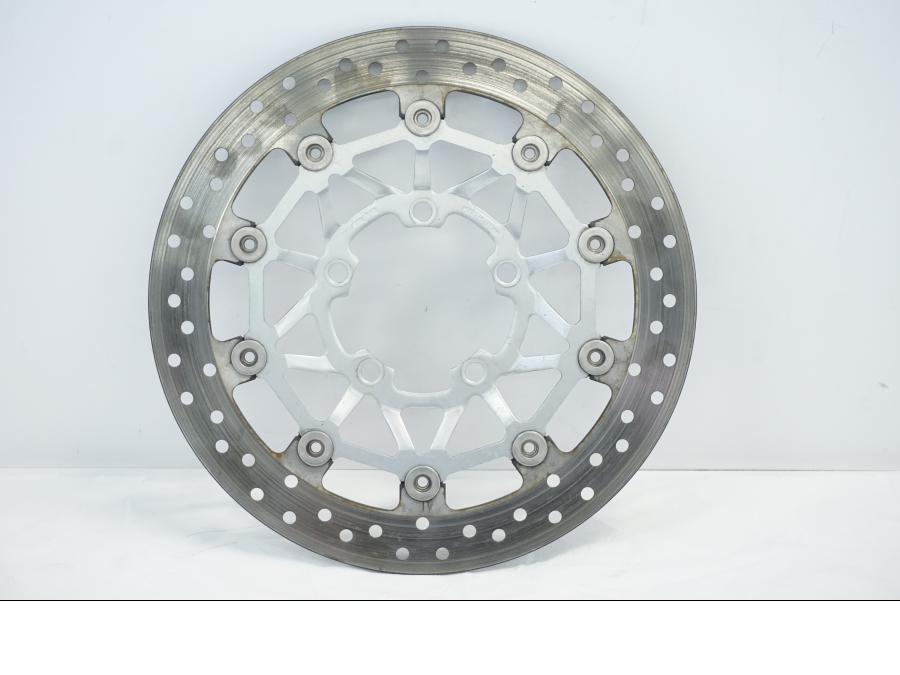 Framsidan på Bromsskiva från en Triumph Daytona 675 -2010 motorcykel.