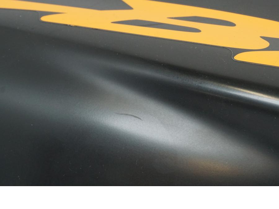 Vänster sida på Bakvinge från en Honda CBR 900 RR -1996 motorcykel.