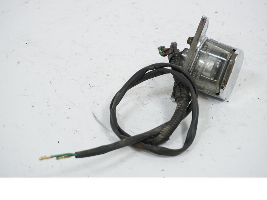 Vänster sida på Skyltbelysning från en Honda VT 600 C -1995 motorcykel.