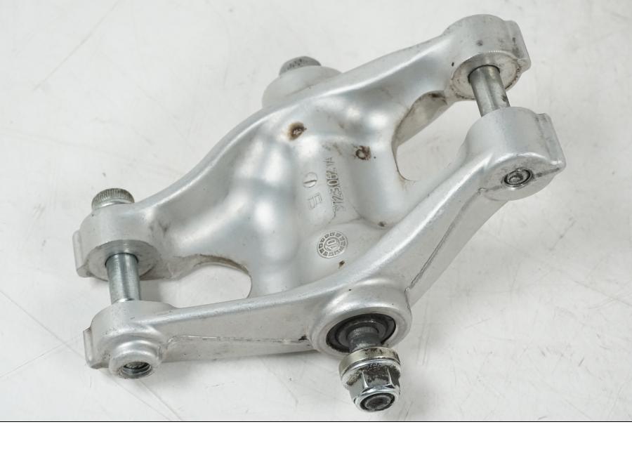 Vänster sida på Stötdämparlänkage från en Ducati Streetfighter S -2011 motorcykel.