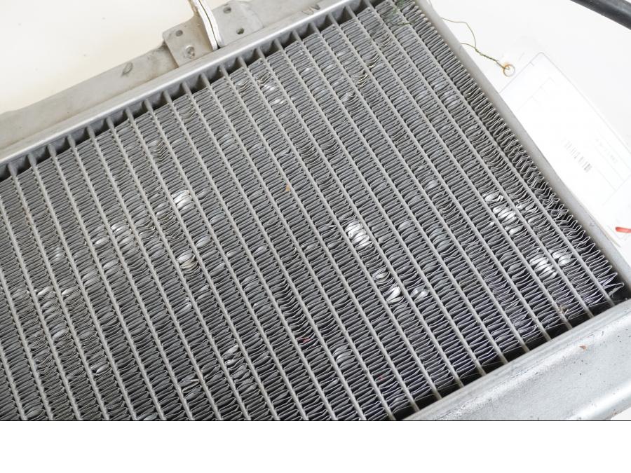 Höger sida på Vattenkyl från en Husaberg FS 650 E -2004 motorcykel.