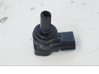 Snett uppifrån på Tomgångsventil från en Honda SH 300 A -2011 scooter.