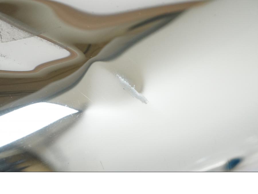 Snett nerifrån på Ljuddämpare från en BMW R 1200 GS -2007 motorcykel.