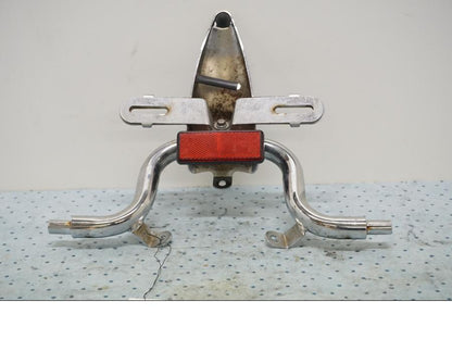 Baksidan på Blinkersfäste från en Yamaha XV 1600 -1999 motorcykel.