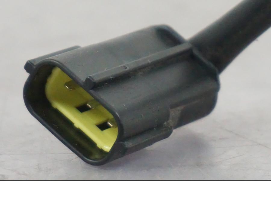 Snett uppifrån på Baklampa från en Triumph Tiger -2009 motorcykel.