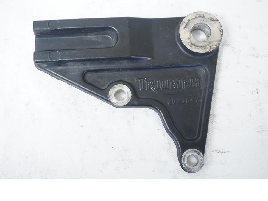 Framsidan på Bromsoksfäste från en Triumph Bonneville -2001 motorcykel.