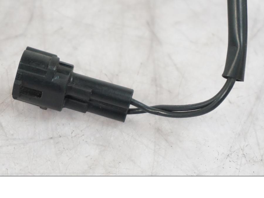 Snett nerifrån på Sidostödsbrytare från en Triumph Tiger -2009 motorcykel.