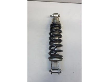 Baksidan på Stötdämpare från en Suzuki SFV 650 A Gladius -2012 motorcykel.