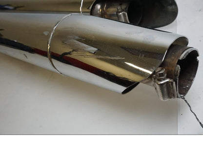 Baksidan på Ljuddämpare Sport från en H-D Harley diverse -2004 motorcykel.