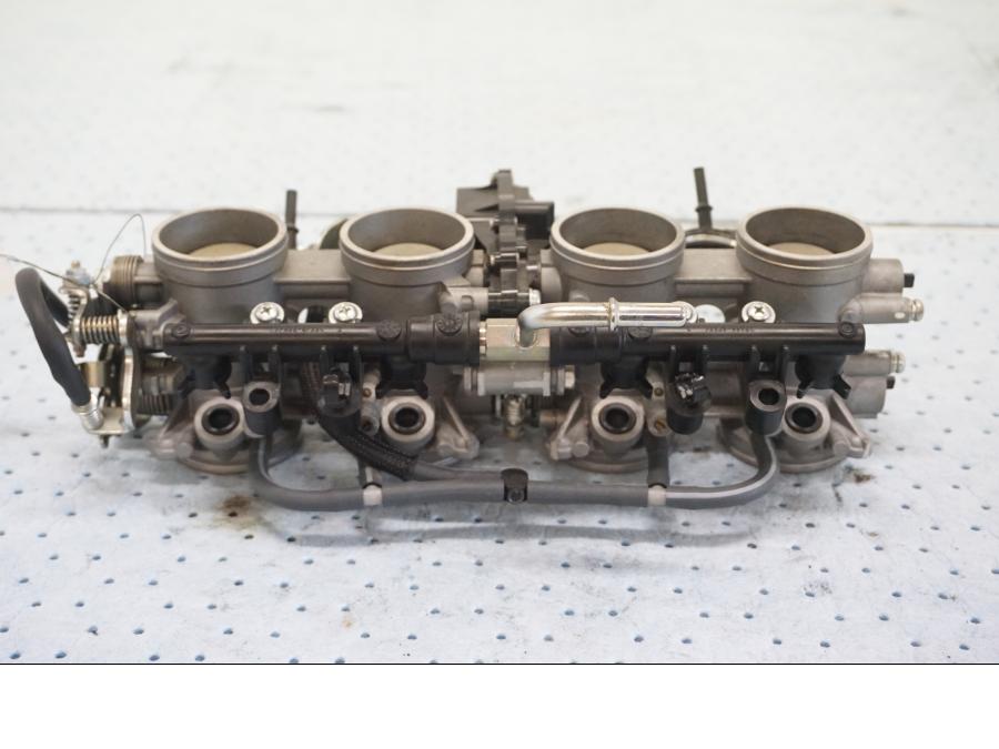 Framsidan på Spjällhus från en Kawasaki Z 900 -2019 motorcykel.