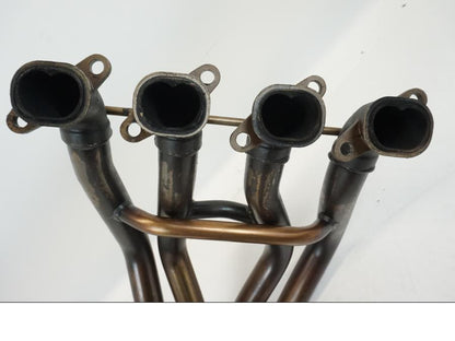 Snett uppifrån på Grenrör från en Triumph TT 600 -2002 motorcykel.